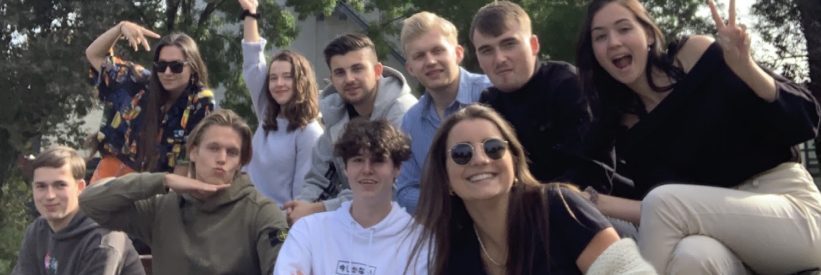 Group of friends outdoors on campus